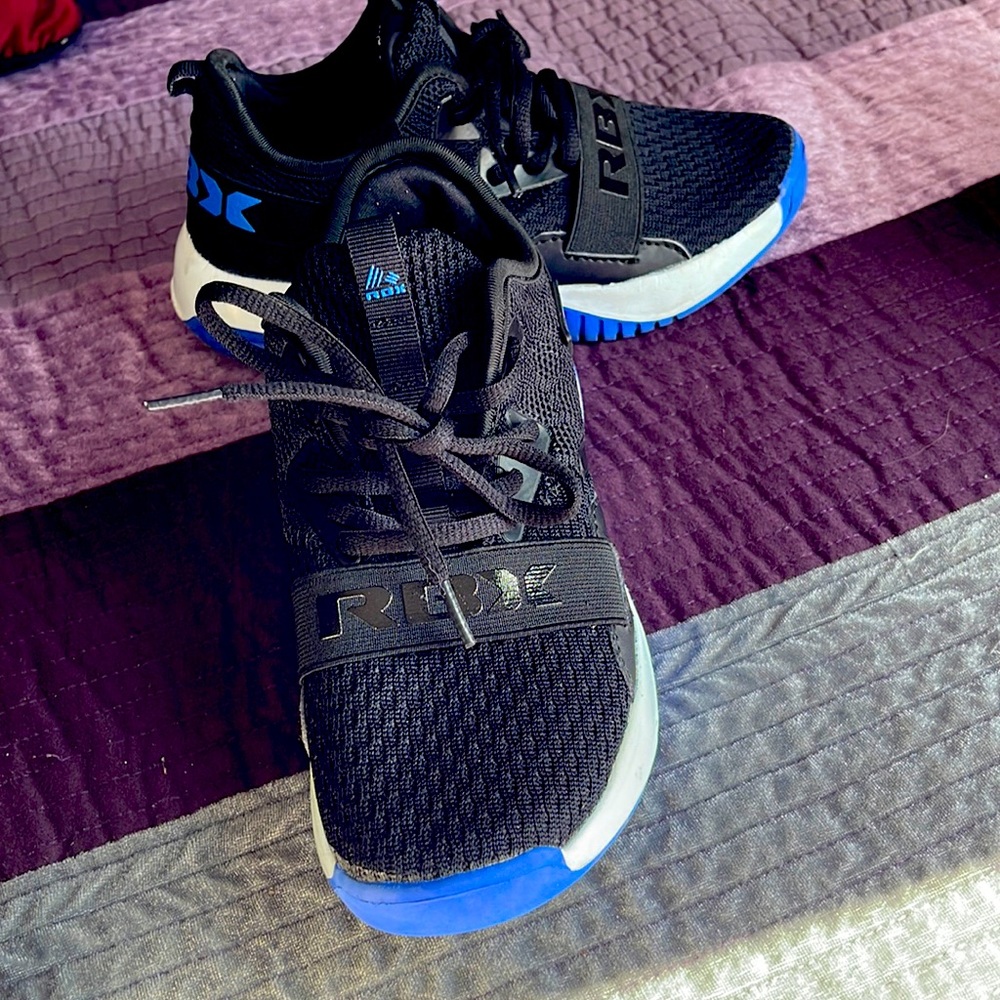 Shoes that are black and blue letters.